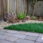 P1010187 Here is another view of the patio facing another small lawn and a bioswale to manage storm runoff.